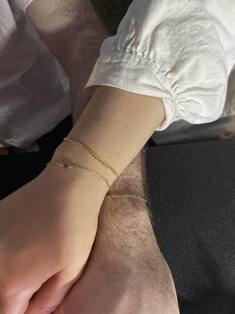 husband and wife with permanent jewelry